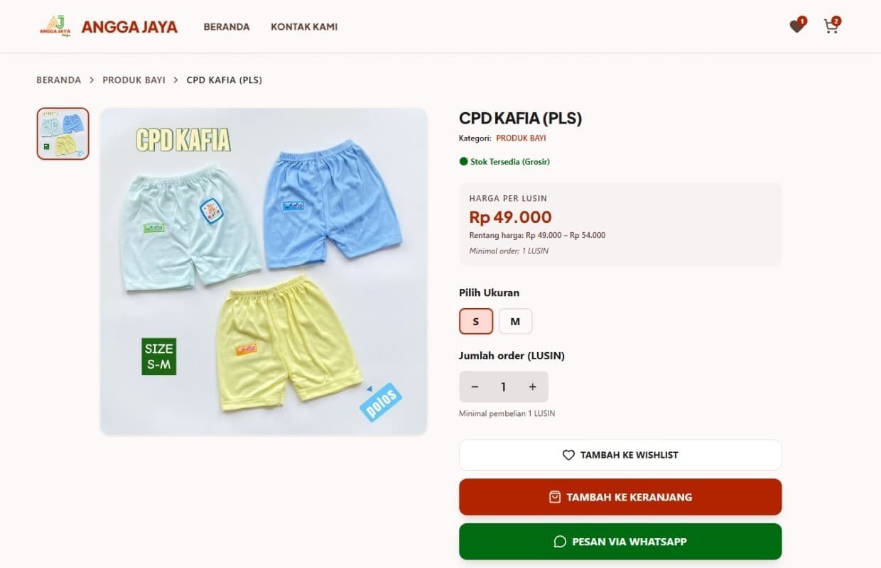 Screenshot website e-commerce grosir pakaian Anggajaya dengan katalog produk dan sistem pemesanan online.